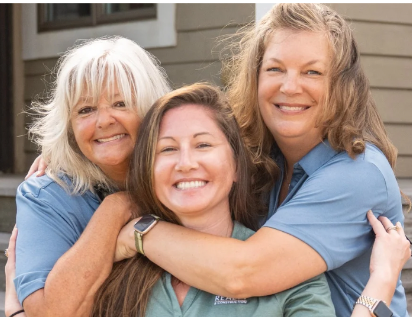 The Beach Realty Marketing Department smiling together