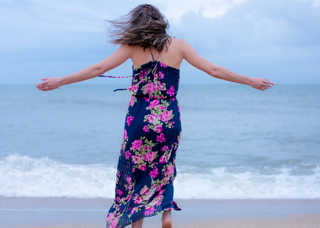 Wind in your hair, enjoying the beach, ocean breeze, dancing on the beach