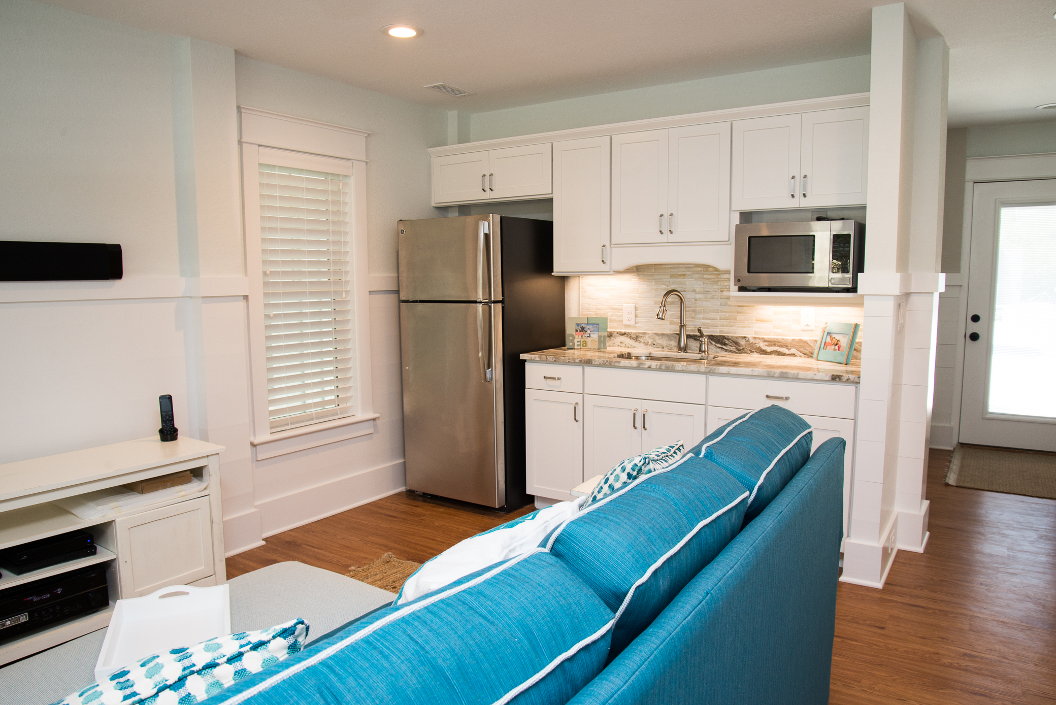 Lower level living area with wet bar and full size refrigerator