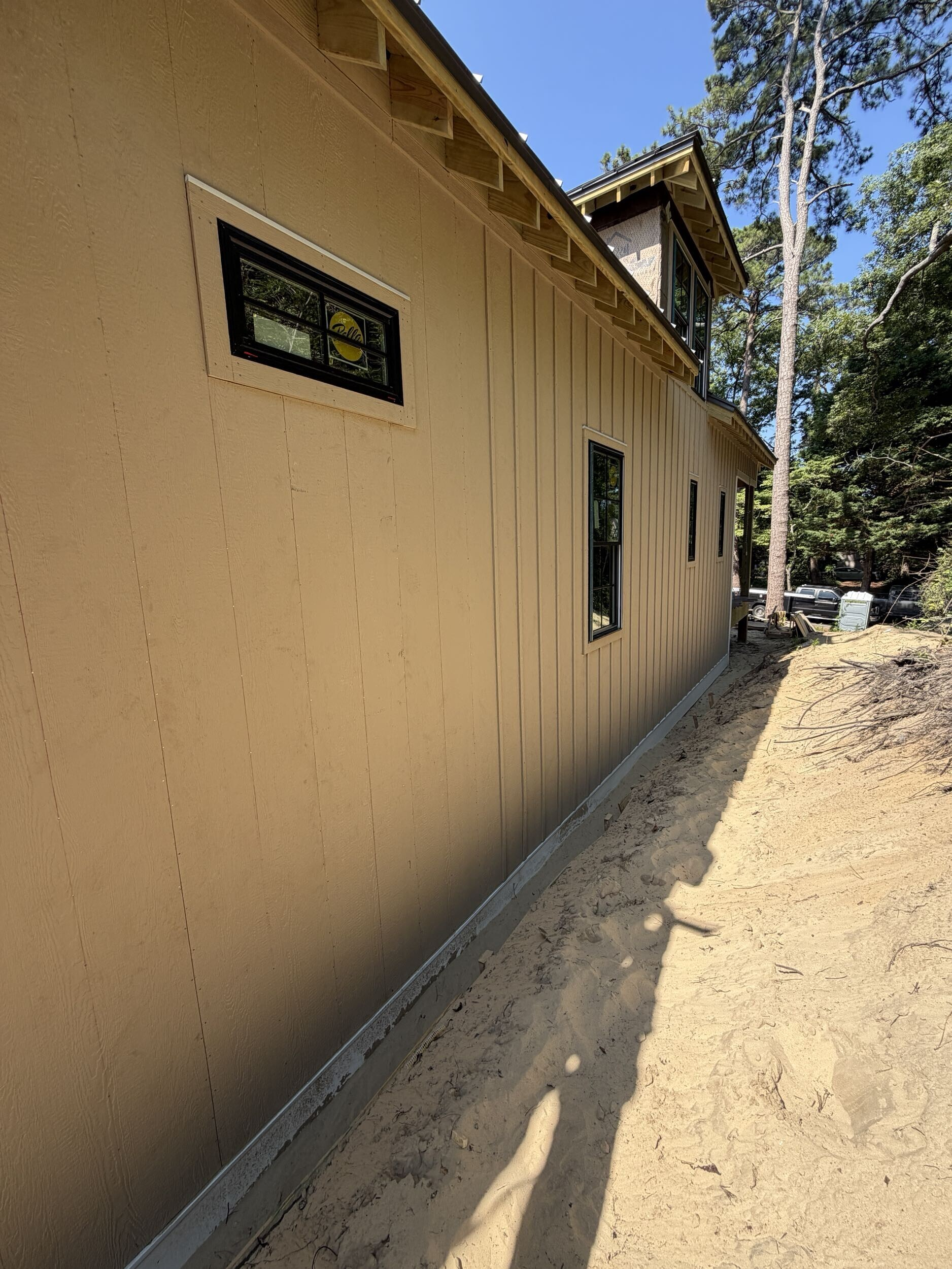 LP SmartSide board-and-batten siding installed on a custom home in Southern Shores