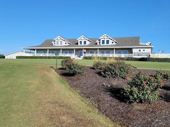 The white clubhouse and its three roof gables at Sea Scape Golf links in Kitty Hawk, N.C.