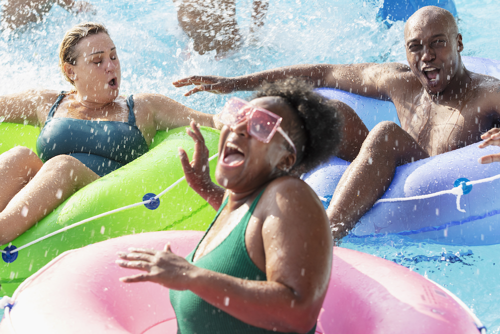 friends in tubes at waterpark